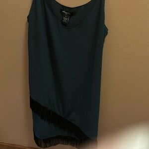 Francesca’s dress size medium teal color with black fringe